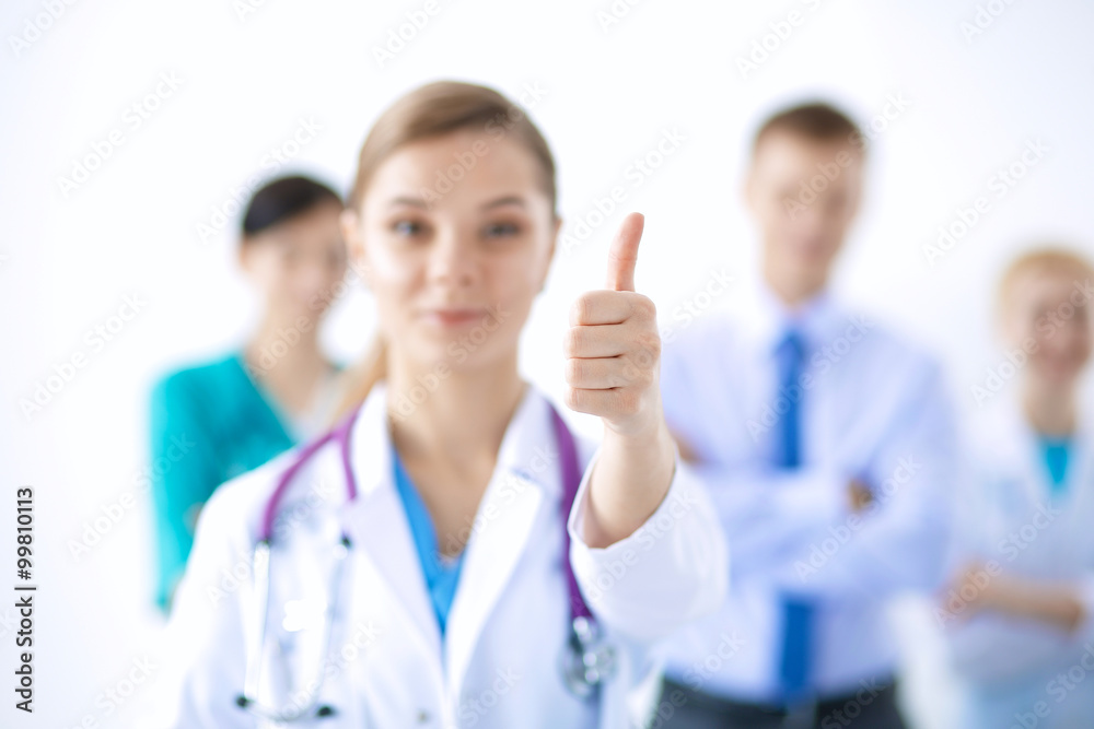 Young happy female doctor showing thumbs up Young happy female doctor showing thumbs up