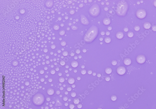 water droplets on a purple background