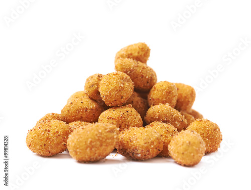 Pile of crunchy coated nuts isolated