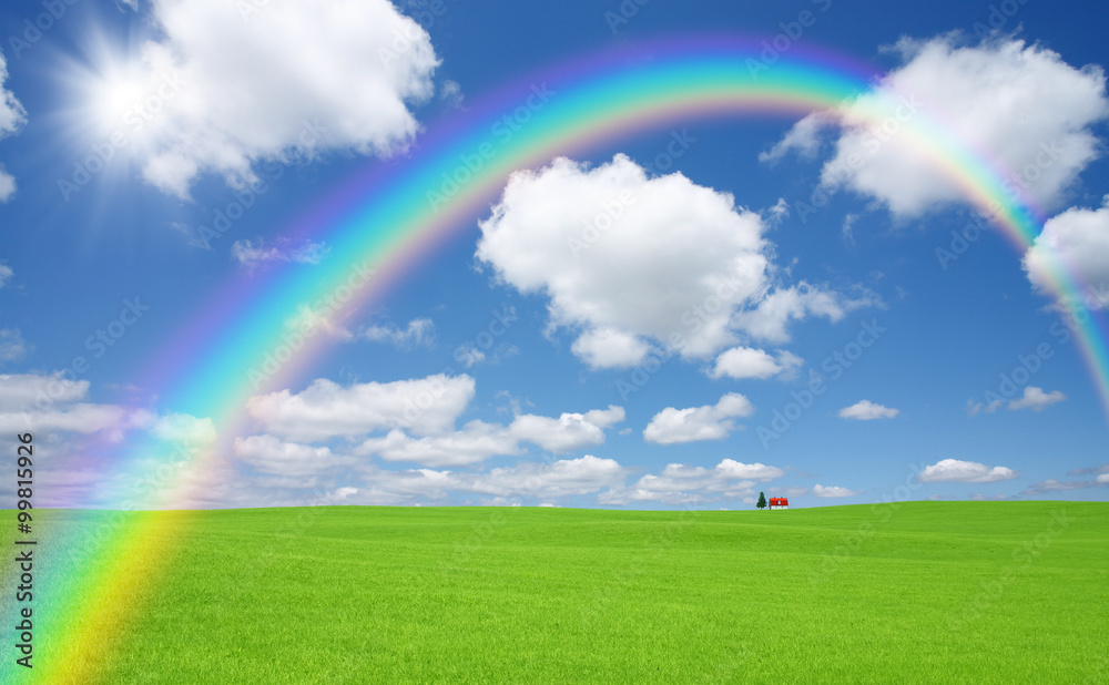 Green grass and red roof house and rainbow Green grass and red roof house and rainbow