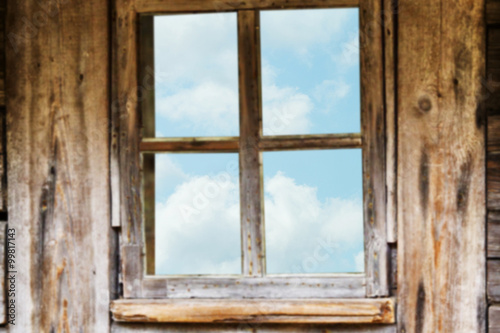 Old wooden window frame  spring  flowering trees.