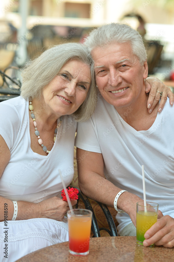 Old couple drinking juice Old couple drinking juice