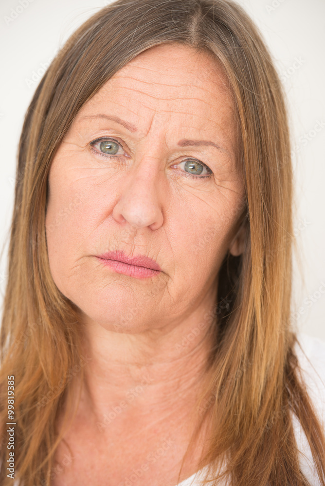 Thoughtful sad mature woman posing Thoughtful sad mature woman posing