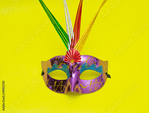 Carnival mask isolated on yellow background