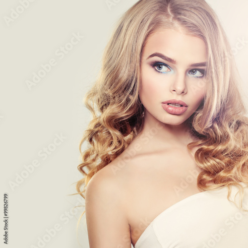 Beautiful Blonde Woman with Long Wavy Hair