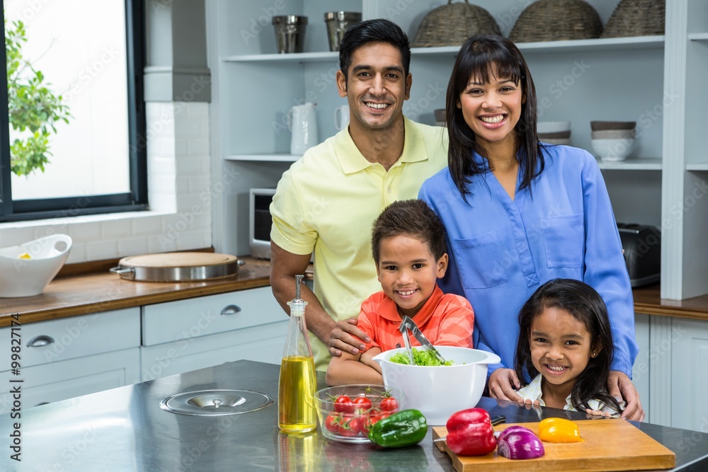 Portrait of happy family in the kitchen