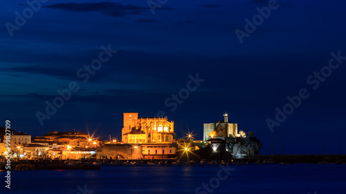 Panoramic night of Castro Urdiales with the church and Castle lighthouse, Castro Urdiales, Cantabria photo