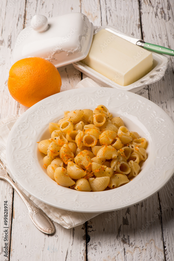 pasta with butter and grated orange peel pasta with butter and grated orange peel