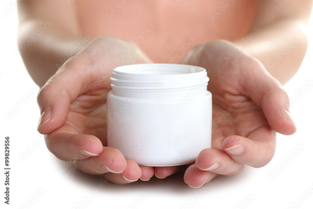 The woman is holding an outdoor moisturizer on white isolated background The woman is holding an outdoor moisturizer on white isolated background