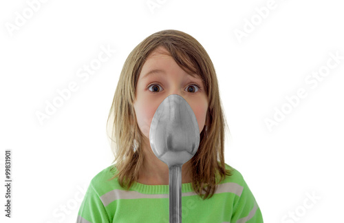 Girl Hiding Face Behind a Spoon