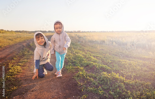 Boy and girl playing outdoors