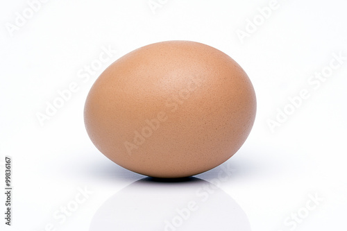 Egg on white background with reflection on floor