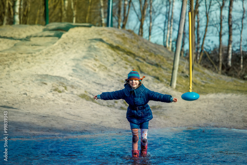 Girl in puddle