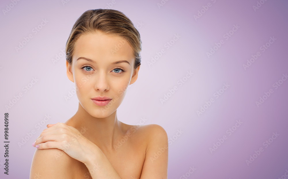 smiling young woman face and shoulders