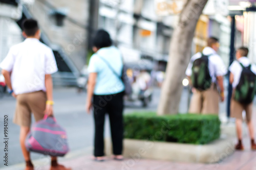 Abstract blur the people waiting for the bus in a city.Bangkok