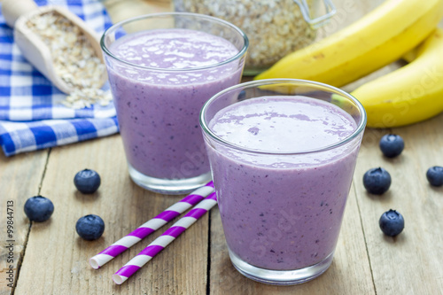 Fresh smoothie with blueberry, banana, oats, almond milk and yogurt