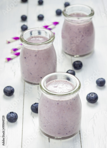 Fresh smoothie with blueberry, banana, oats, almond milk and yogurt