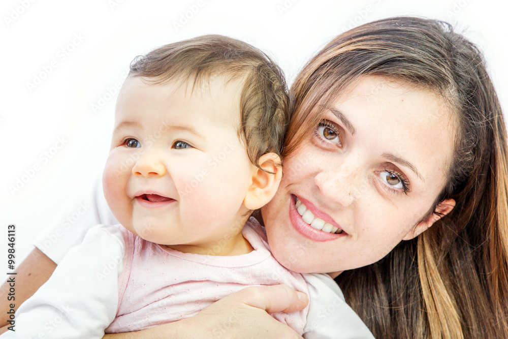 close-up of a smiling young woman with her baby on white background close-up of a smiling young woman with her baby on white background