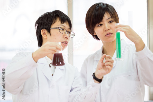 Asian female scientists in lab
