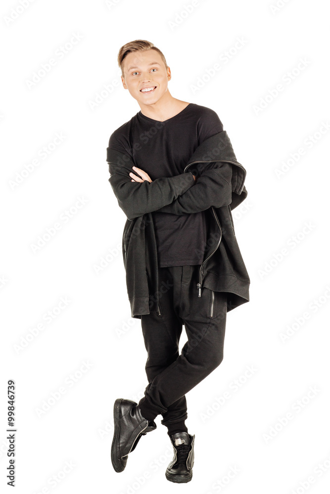 Full length portrait of a happy male fashion man against wall i Full length portrait of a happy male fashion man against wall i