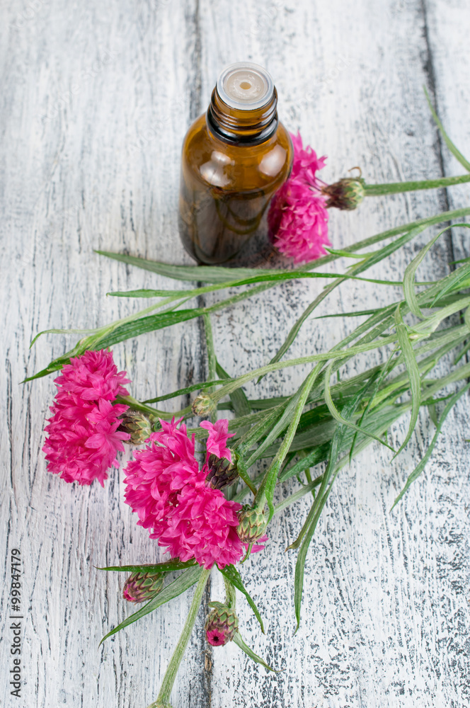 Aroma oil and cornflowers Aroma oil and cornflowers