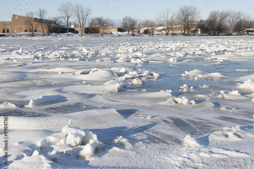 Chunks of ice and snow frozen together in the Fox River.