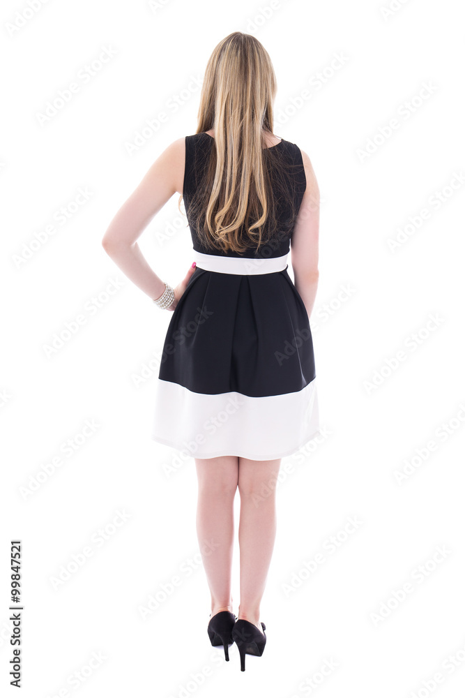 back view of beautiful young plus size woman in black dress isol back view of beautiful young plus size woman in black dress isol