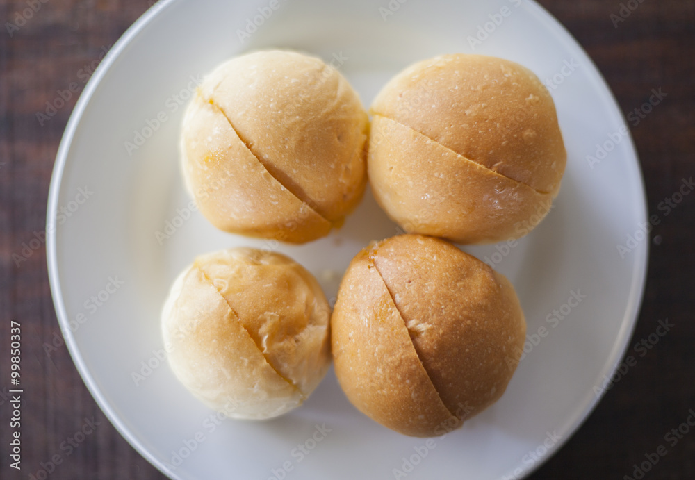 Sliced of round bread with butter. Sliced of round bread with butter.