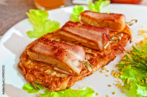veal meat with bacon