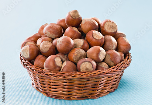 Hazelnuts on Blue Background