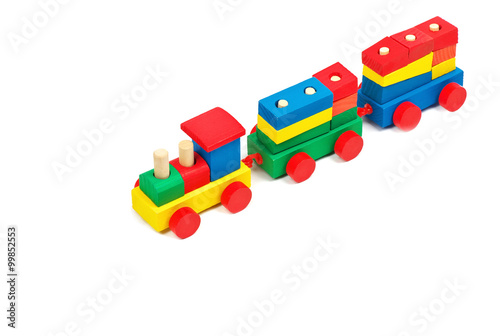 Wooden colorful toy train isolated on white background