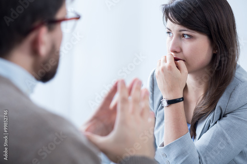 Stressed woman with personal coach