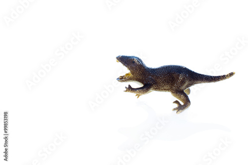 toy dinosaur velociraptor. miniature plastic toy dinosaur isolated on a white background