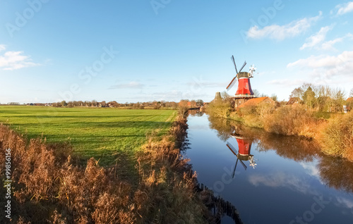 Greetsiel, traditional Windmill photo