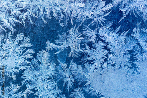 Frosty winter pattern at a window glass