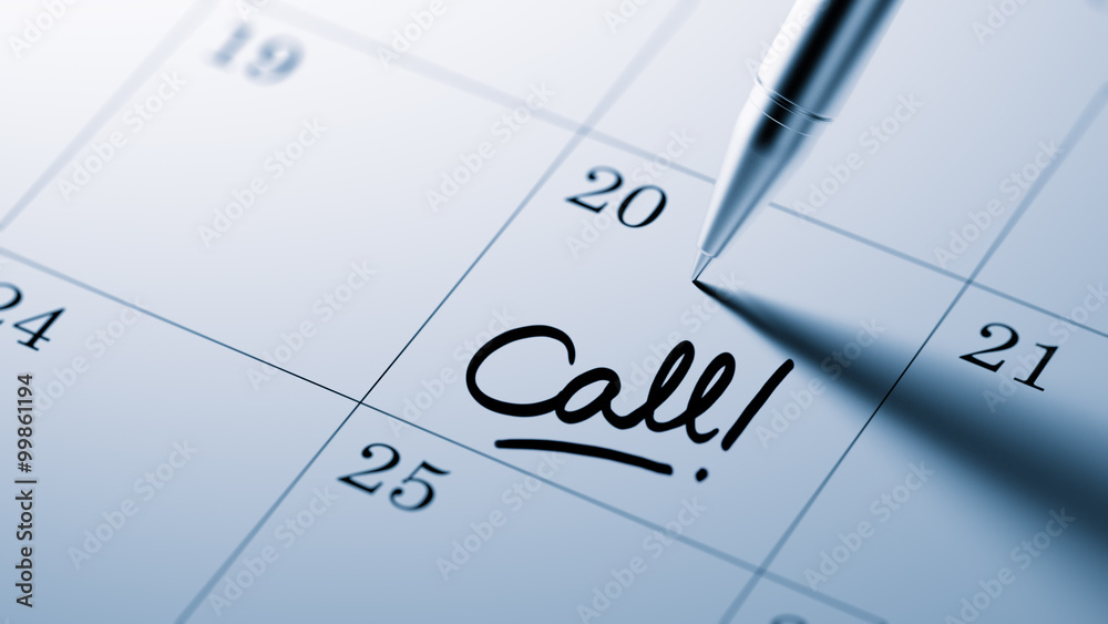 Closeup of a personal agenda setting an important date written w Closeup of a personal agenda setting an important date written w