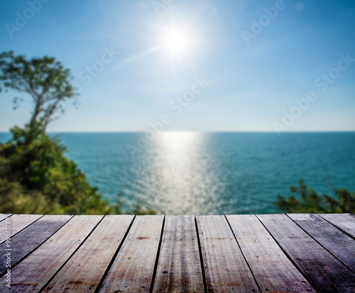 Blurred landscape with wood terrace 