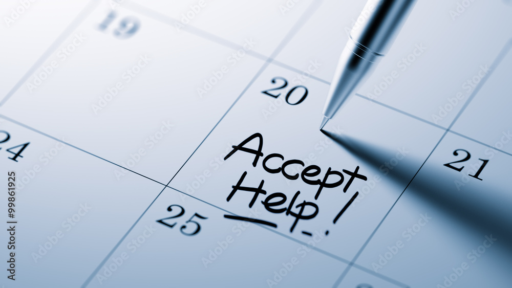 Closeup of a personal agenda setting an important date written w Closeup of a personal agenda setting an important date written w