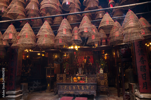 Incense coils and altar at the Man Mo Temple in Tai Po, Hong Kong, China. photo