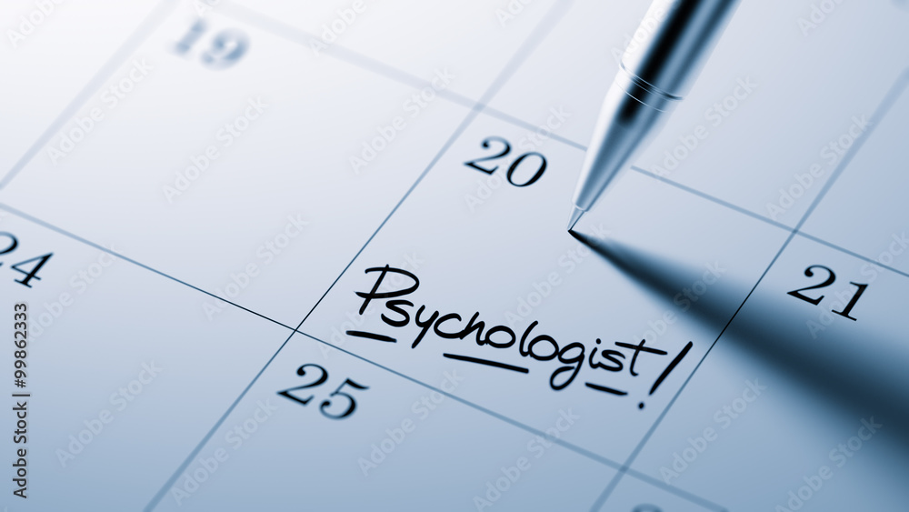 Closeup of a personal agenda setting an important date written w Closeup of a personal agenda setting an important date written w