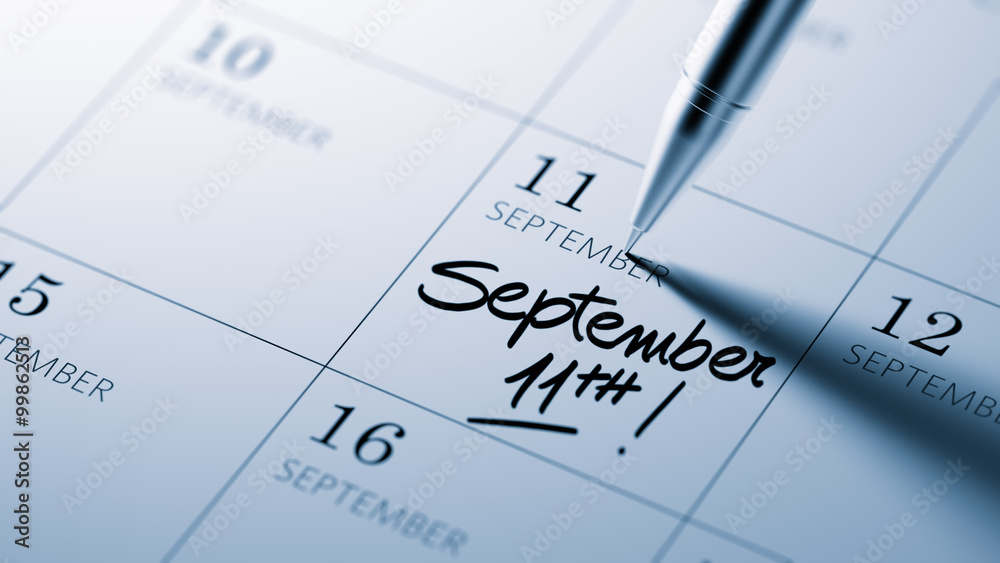 Closeup of a personal agenda setting an important date written w Closeup of a personal agenda setting an important date written w