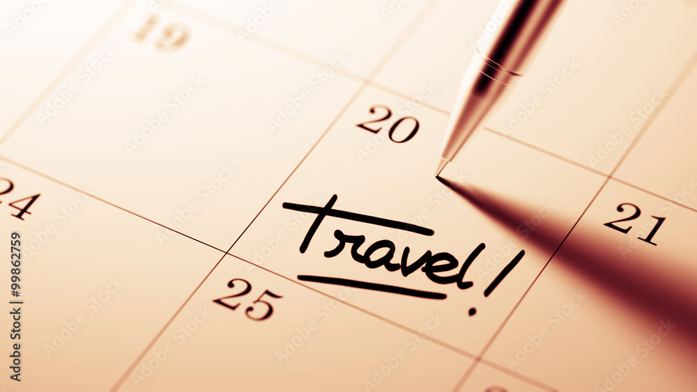 Closeup of a personal agenda setting an important date written w Closeup of a personal agenda setting an important date written w