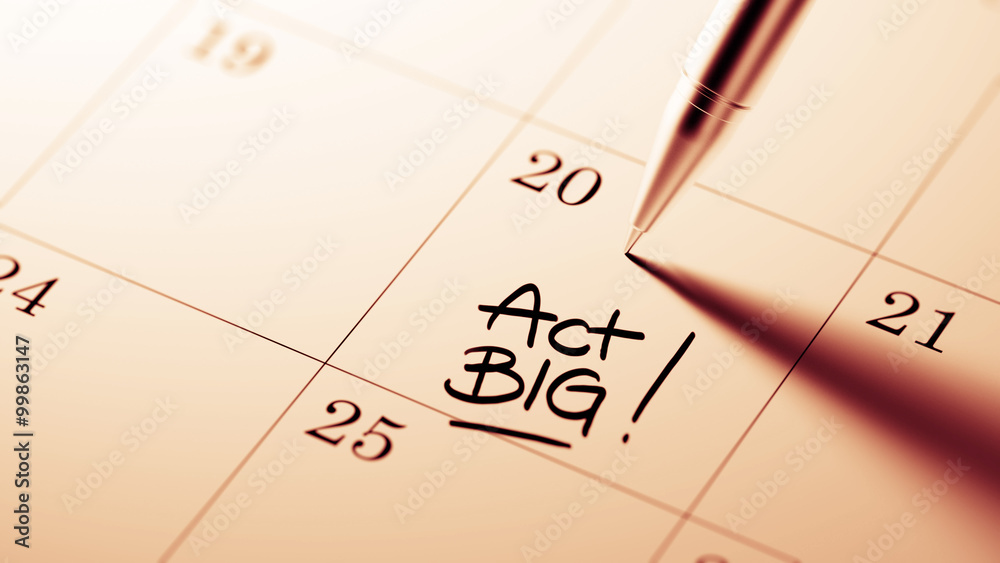 Closeup of a personal agenda setting an important date written w Closeup of a personal agenda setting an important date written w