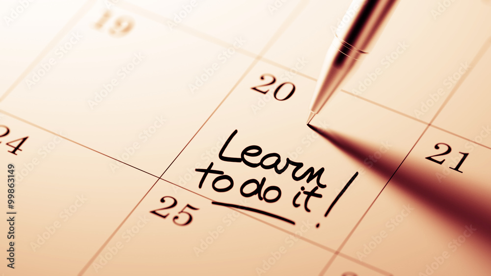 Closeup of a personal agenda setting an important date written w Closeup of a personal agenda setting an important date written w