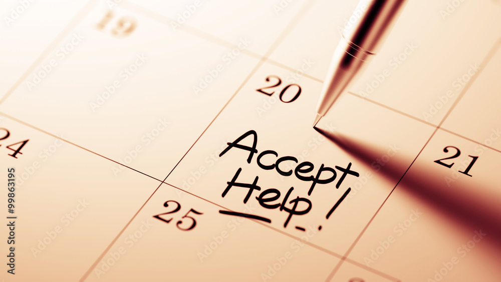 Closeup of a personal agenda setting an important date written w Closeup of a personal agenda setting an important date written w