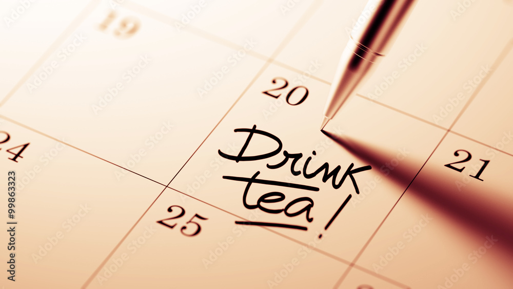 Closeup of a personal agenda setting an important date written w Closeup of a personal agenda setting an important date written w