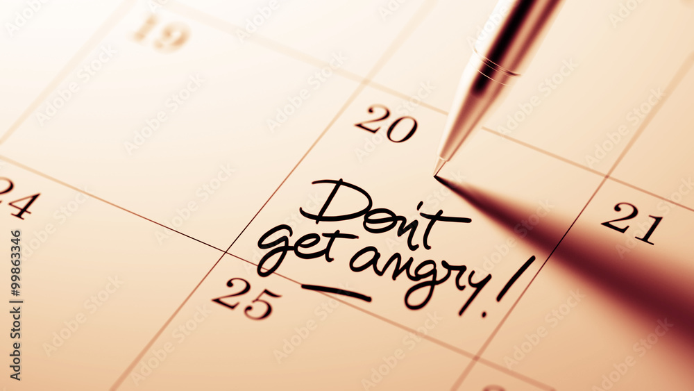 Closeup of a personal agenda setting an important date written w Closeup of a personal agenda setting an important date written w