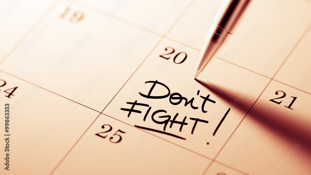 Closeup of a personal agenda setting an important date written w Closeup of a personal agenda setting an important date written w