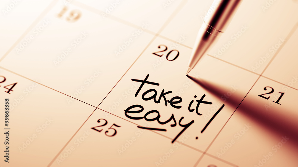 Closeup of a personal agenda setting an important date written w Closeup of a personal agenda setting an important date written w