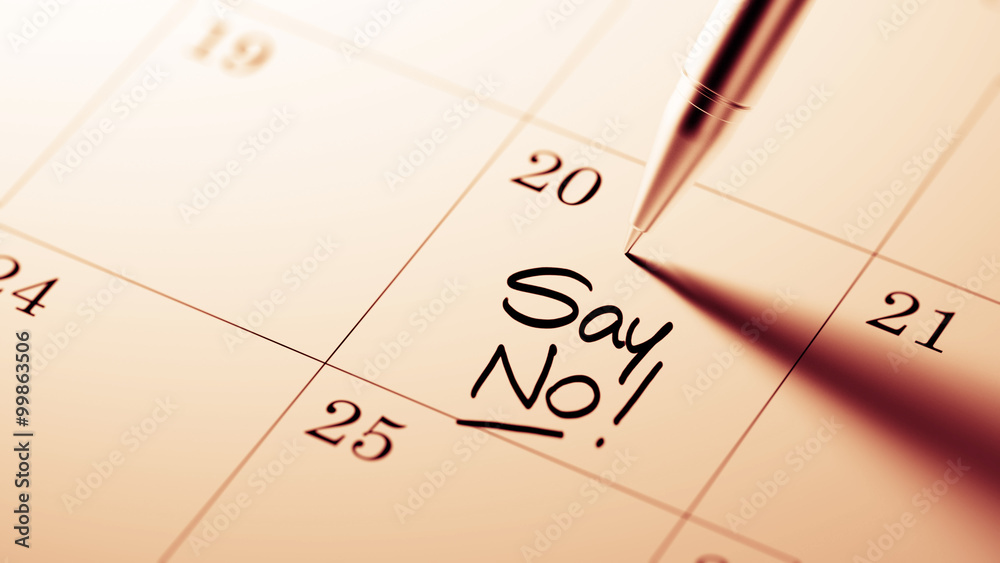Closeup of a personal agenda setting an important date written w Closeup of a personal agenda setting an important date written w